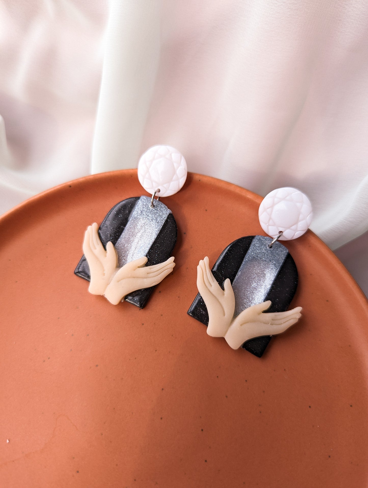 A NEW HAND TOUCHES THE BEACON